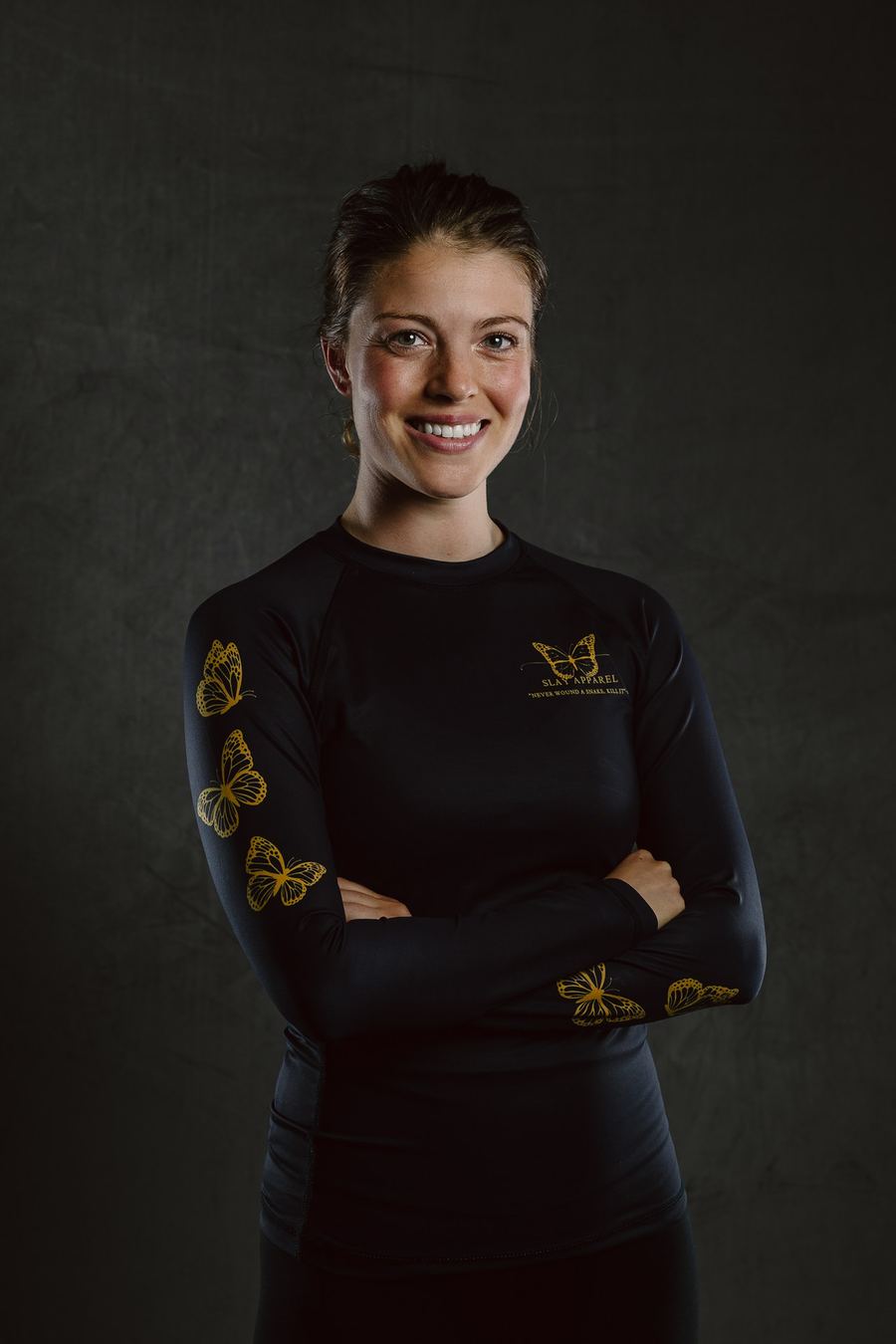 Fighter in a black Butterfly Edition rashguard