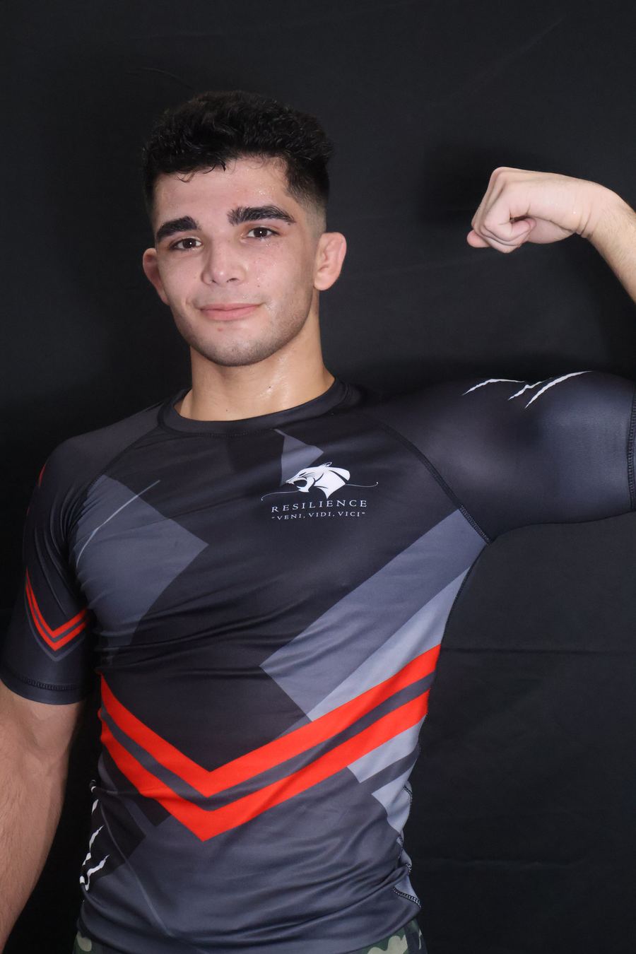 Fighter in a Resilience rashguard